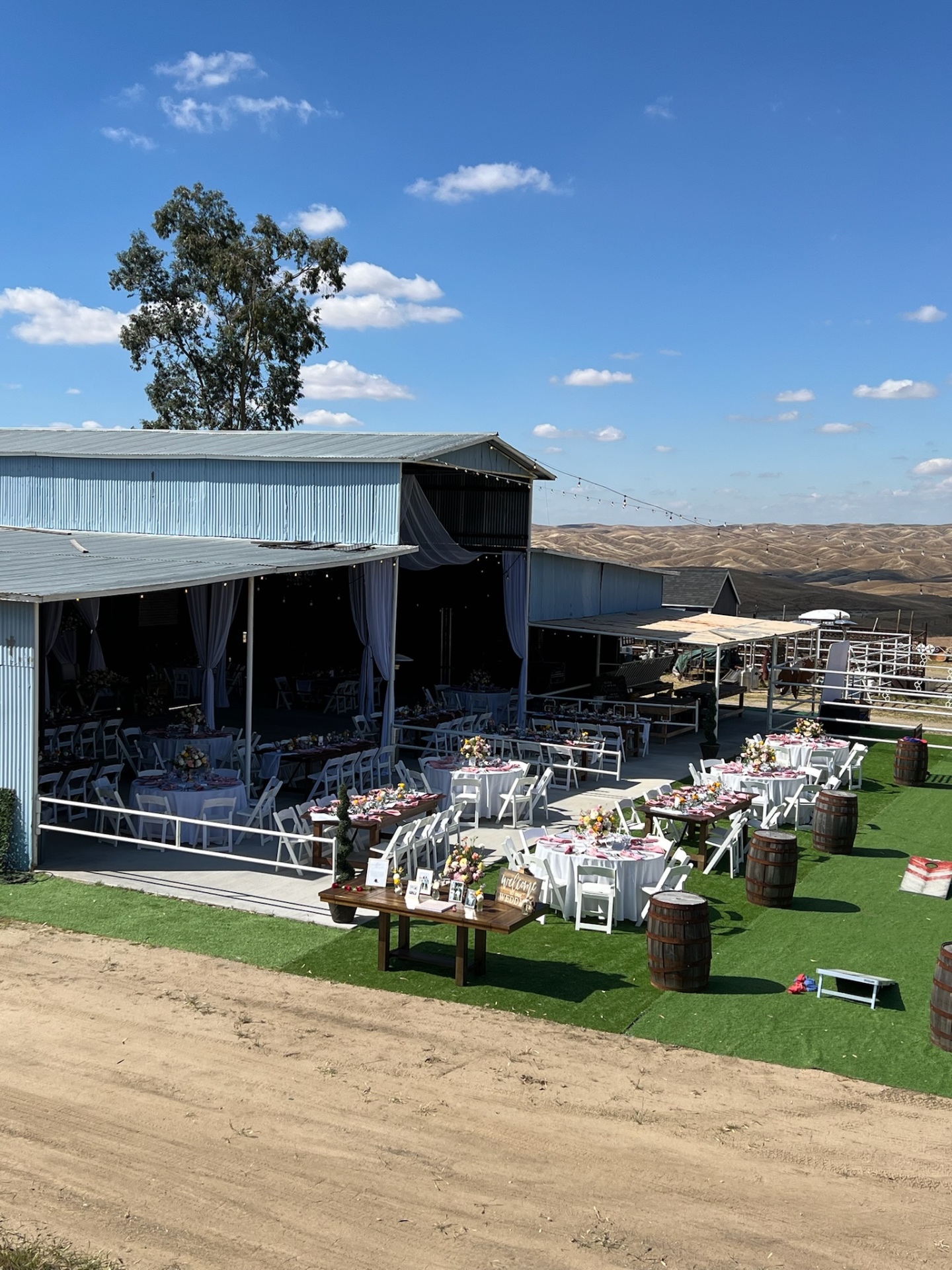 Reception setup with hillside views